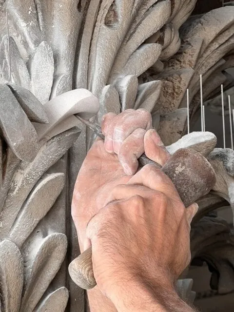 Close up of Established Stone doing Stone restorative Stone Masonry work
